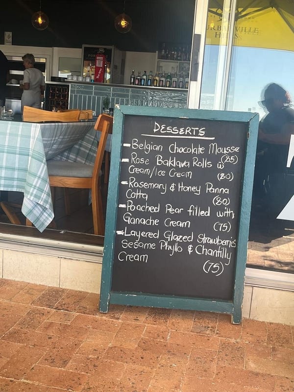 Café Zest chalkboard menu, April 2025